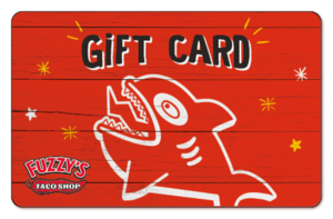 Fuzzys Taco logo with 'Gift Card' and fish over red wooden background